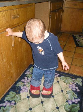 Taylor (3) filling Grandpa's shoes? : ) 2007