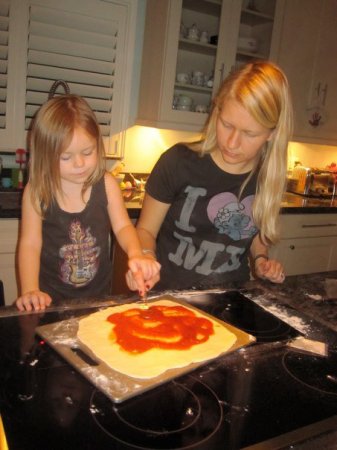 Kristen and her oldest (almost 3) making pizza!
