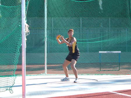 Angelica throwing Discus for Andrew Hill