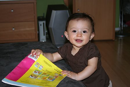 Kira loves to read! 06/2008