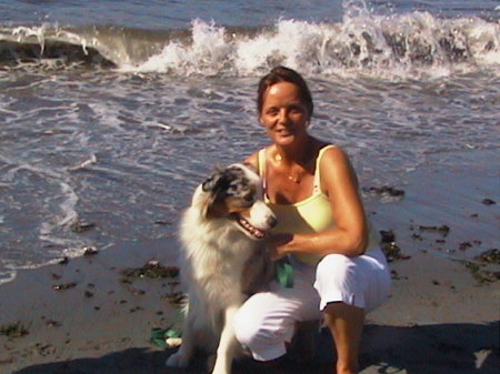 wife and dog at the beach