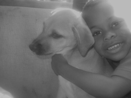 My son Tyreek and his dog A'Kitah