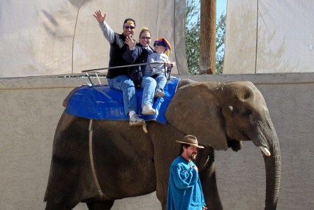 FAMILY ON ELEPHANT RIDE