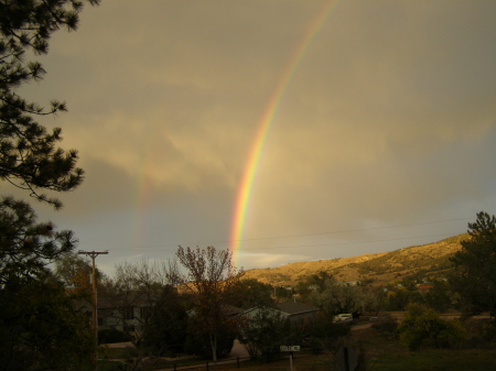 2 rainbows! pics taken on my front deck