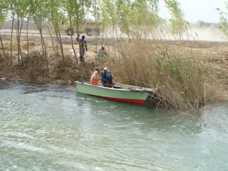 workers in a boat