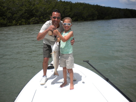 Carlos and Madison fishing in the gulf.