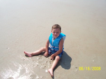 Devin playing in the sand