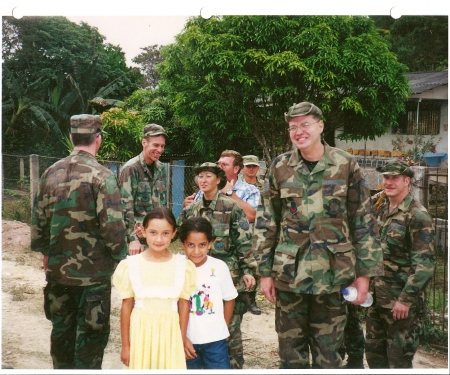 John helping kids in West.Honduras May 2001