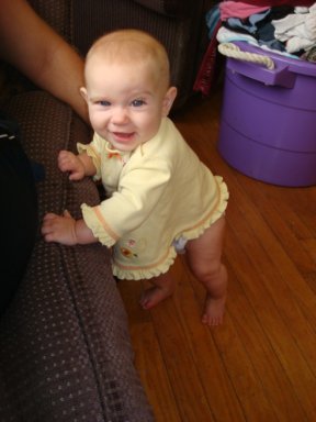Ashlyn 6 months.  Trying to walk.