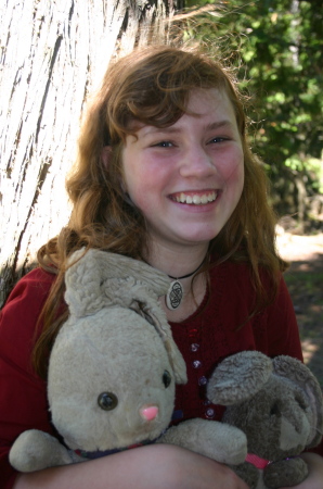 my oldest daughter with her bunnies