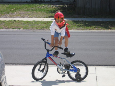 Shane on his training wheel bicycle