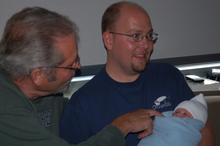 Proud daddy, Bob Hawk with Grandpa Olson