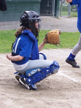 Kyhlie catching for her softball team 2008