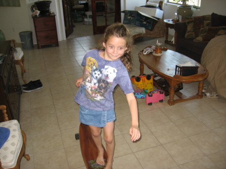ridin her brother's long board...