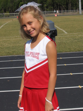 My baby Carlie who is cheerleading