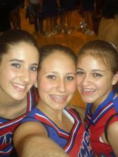 Aimee, my youngest on the right cheerleading