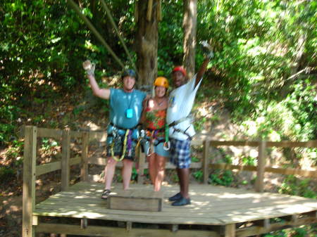 zip lining atop the trees