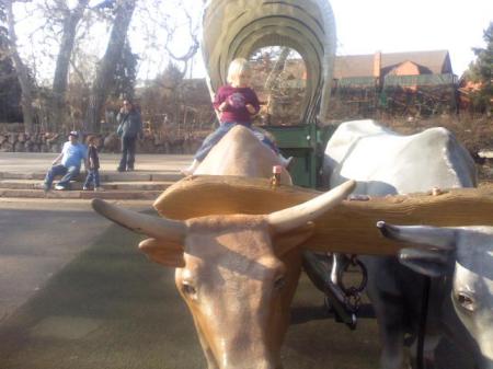 Kayla posing on ox statue