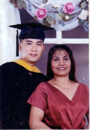 Graduate college with wife 2003