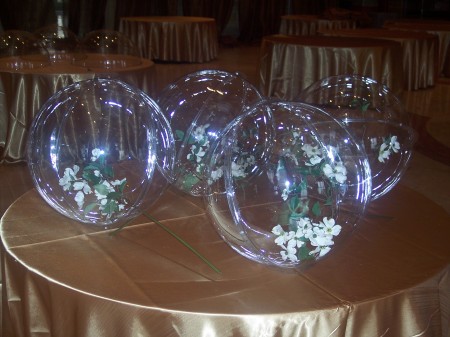 Clear spheres filled with white Dogwoods.