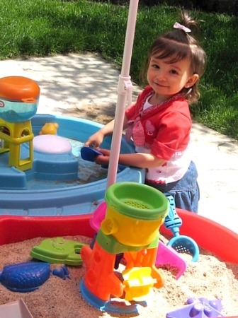 Julia playing in the backyard. 16 months old