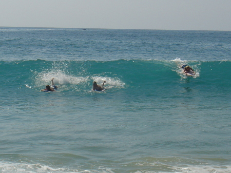 Emily and Andrea body surfing