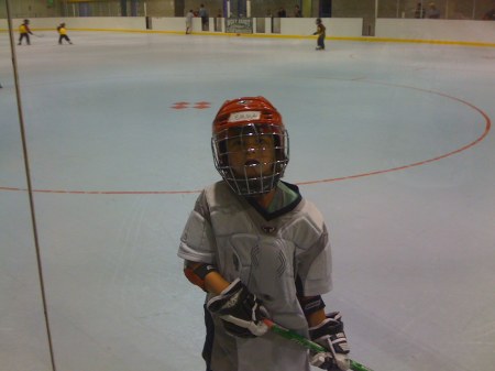 Emma playing hockey