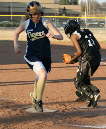 She plays softball too