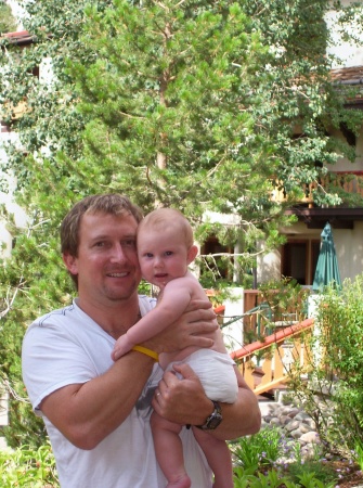 Little boy Beck hangin' with dad up at Squaw.