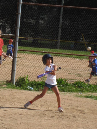 My daughter Lydia playing softball