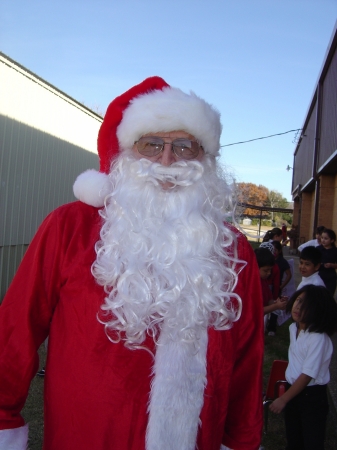 Howard playing Santa at the elementary school