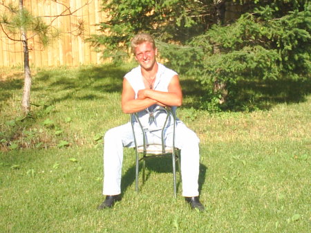 Me sitting in my backyard