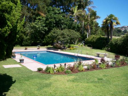 Pool with golf course in the background