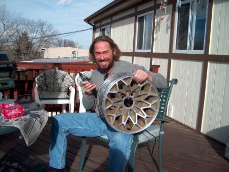 Polishing up the snowflake rims on the deck.