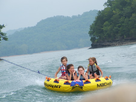 My girls tubin' behind our Boat on DHL
