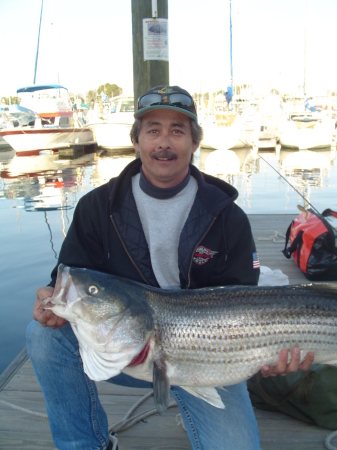 My husband with his catch