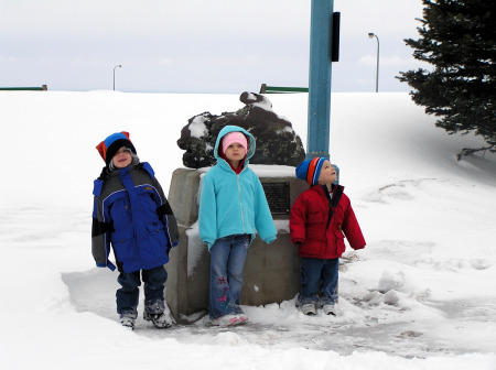 kids are ready to get in the car and warm up