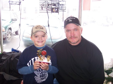 Evan and Dad at their Basketball Party.