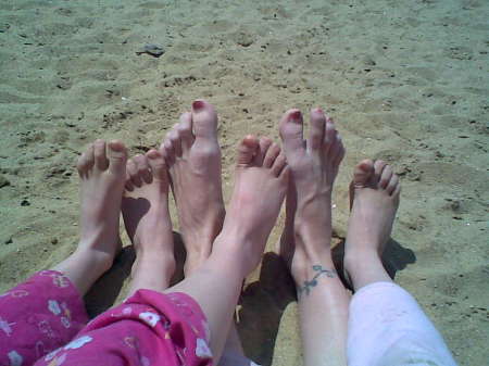 All of our toes at the beach