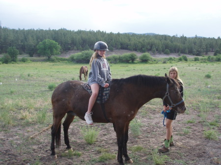 Grand Daughter on our Appaloosa Cloudy..