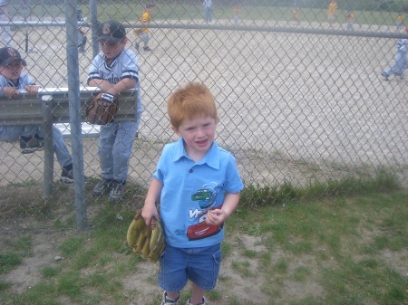 Cody 06/08 David behind fence