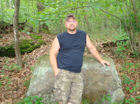 Me  posing by a rock at Ohio Pyle