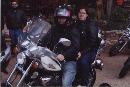 My wife and I on a ride. she wears a helmet wh