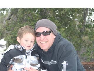 Dad and Zev enjoying snow in the mountains