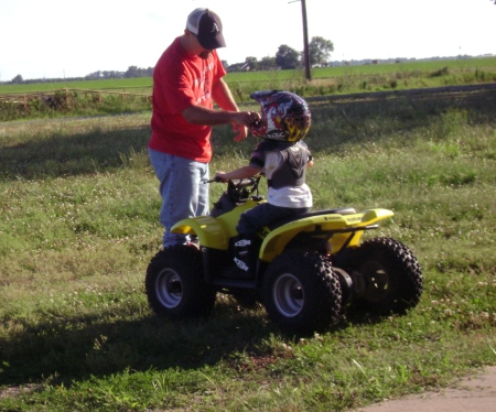 Dalton and me on his first quad. 6.08