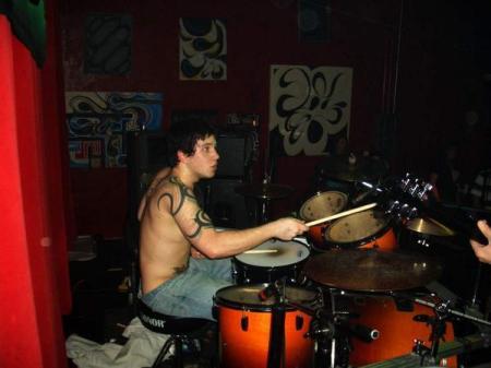 My son playing his drums