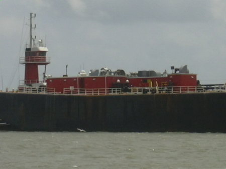 A BARGE AT GALVESTON BAY