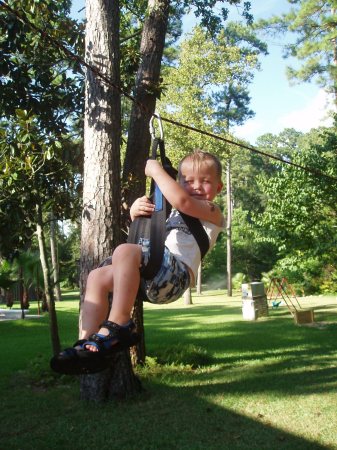 Leo on a zipline in our yard