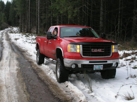 my wife enjoying the snow in the dry