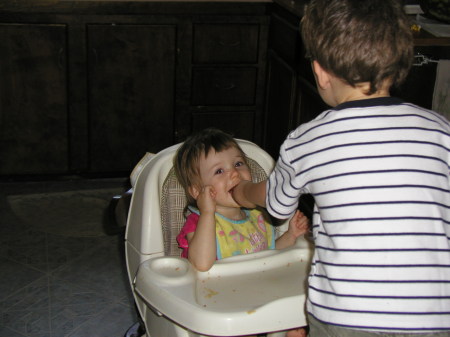 Silas, age 2, feeding Jubilee age 1